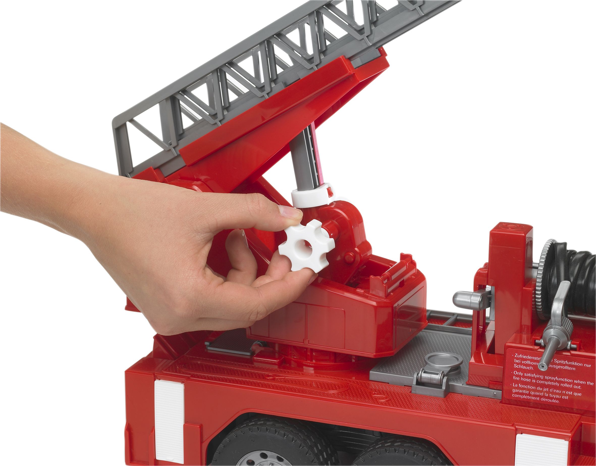 Bruder MAN Feuerwehr mit Drehleiter+Wasserpumpe